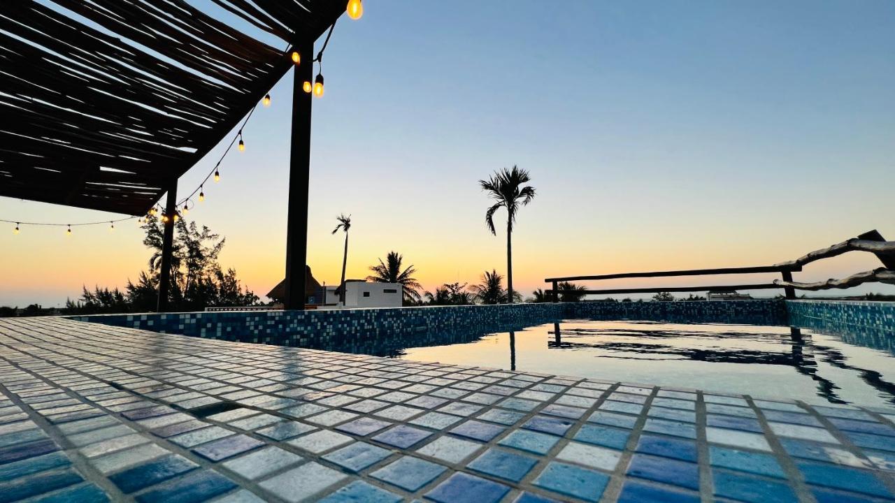 Hotel Mayari Holbox Экстерьер фото Sunset at the pool